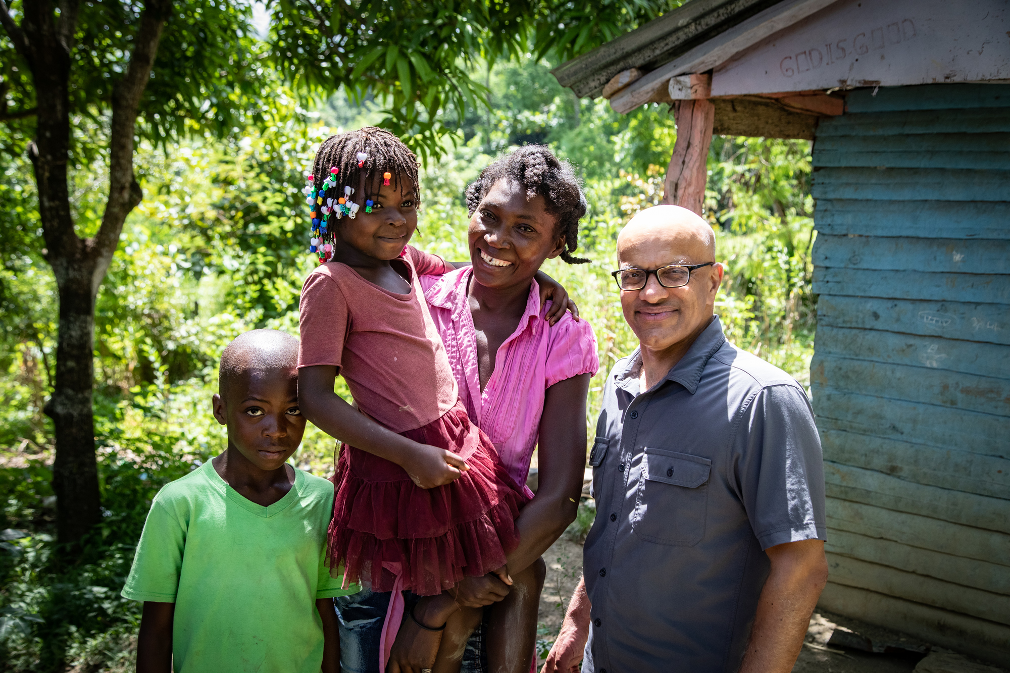 After finding success on Wall Street, Atul Tandon turned back to help those he left behind. In this image, Tandon is in Haiti