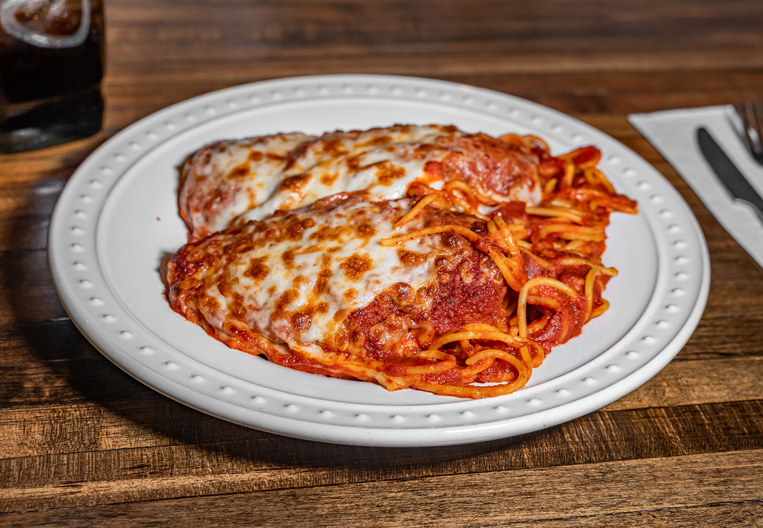 If your mouth isn't watering yet, check out their Chicken Parmesan while you try the Best Pizza in Denver at Corner House