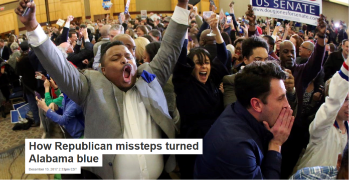 Doug Jones supporters celebrate his stunning victory. AP Photo/John Bazemore