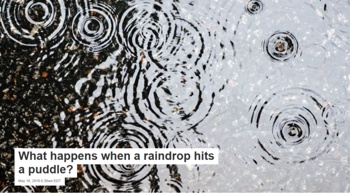 What happens when a raindrop hits a puddle?
