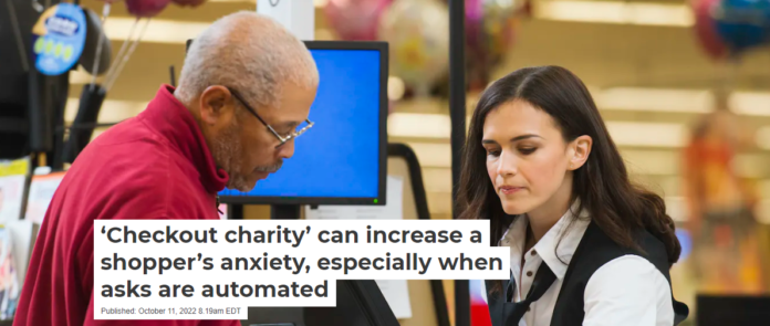 Many trips to the supermarket include a small donation. Erik Isakson/Tetra Images via Getty Images