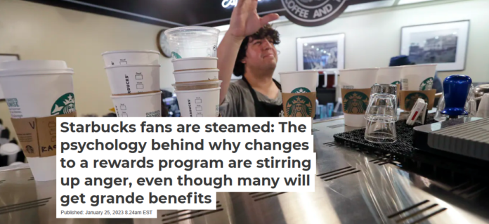 The rewards price to get a free cup of hot coffee at Starbucks is going up. AP Photo/Elaine Thompson