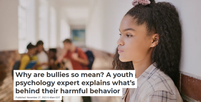 Spreading rumors about others is one form of bullying. LumiNola/E+ via Getty Images