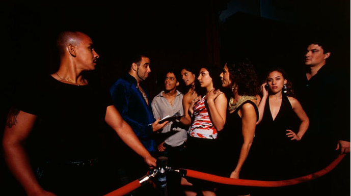 Do bouncers at clubs enforce dress codes equally across races?