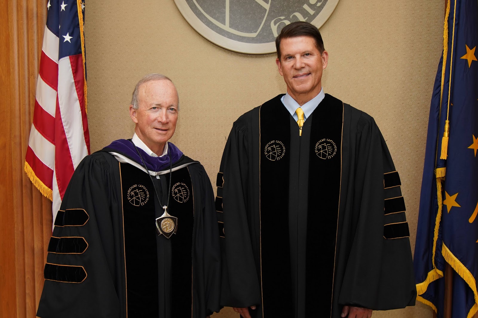 Purdue President Mitch Daniels after bestowing honorary doctorate in engineering on Krach