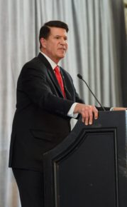 Krach addressing the gathering on the economic security challenges facing the United States