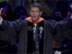 Keith Krach with his hands up at the Perdue Commencement
