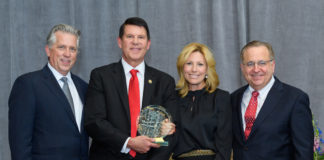 Marc Carlson, Keith and Metta Krach, and Michael Brown, with HBSANC Business Leader of the Year Award