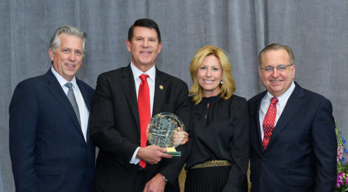 Marc Carlson, Keith and Metta Krach, and Michael Brown, with HBSANC Business Leader of the Year Award