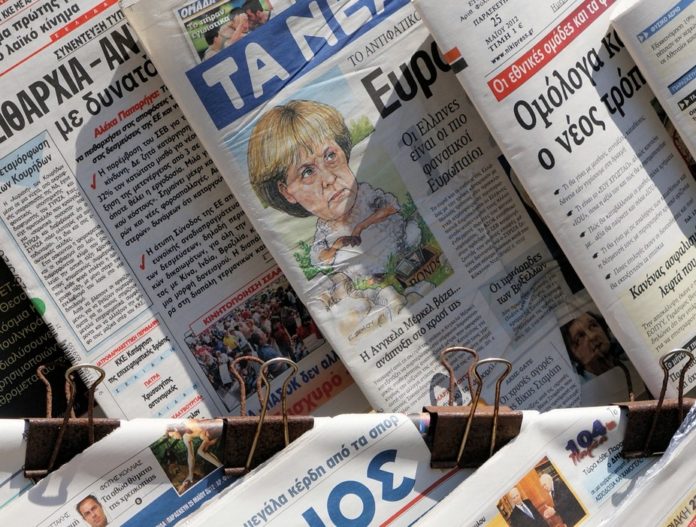 Merkel in the middle as Greek debt clouds the vote. Hindrik Sijens, CC BY