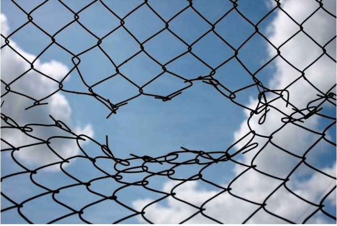 There are a lot more holes in cybersecurity fences. iomis/Shutterstock.com