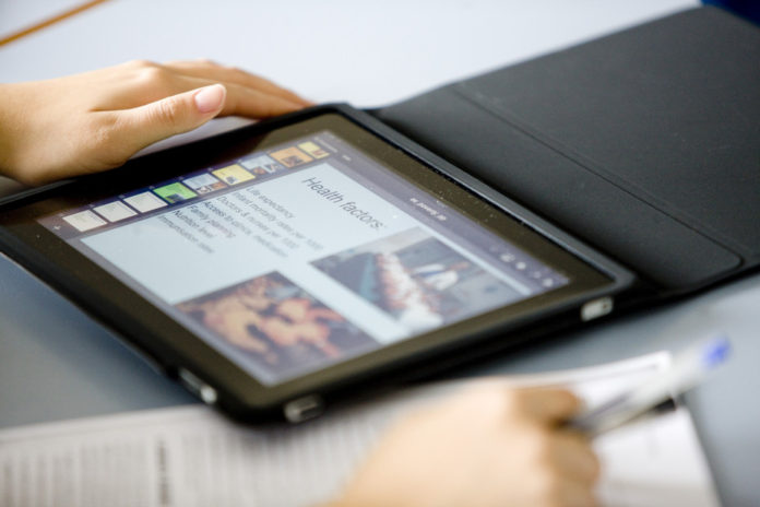 Should mobile devices be encouraged in class? Trinity College, CC BY-NC-ND