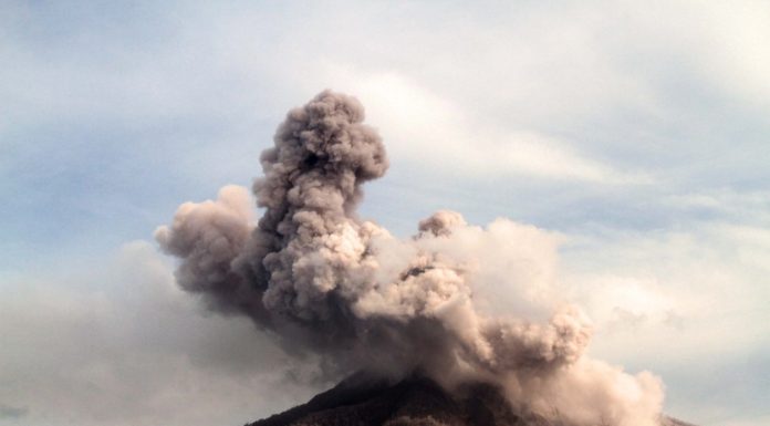 Under the volcano: predicting eruptions and coping with ash rain