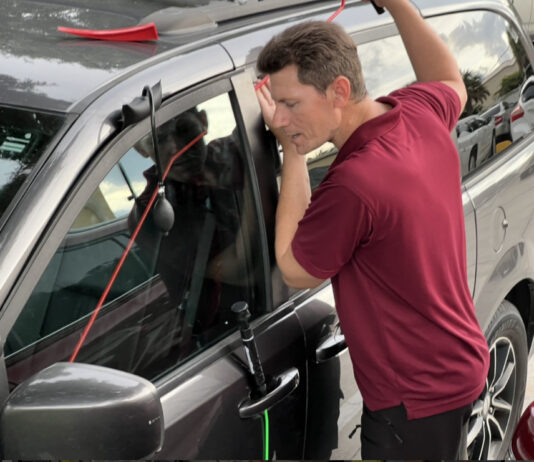 Donald Jayhan of North Port Locksmiths and Good Shepherd Taxi swiftly unlocks a 2019 Dodge Grand Caravan in North Port, Florida