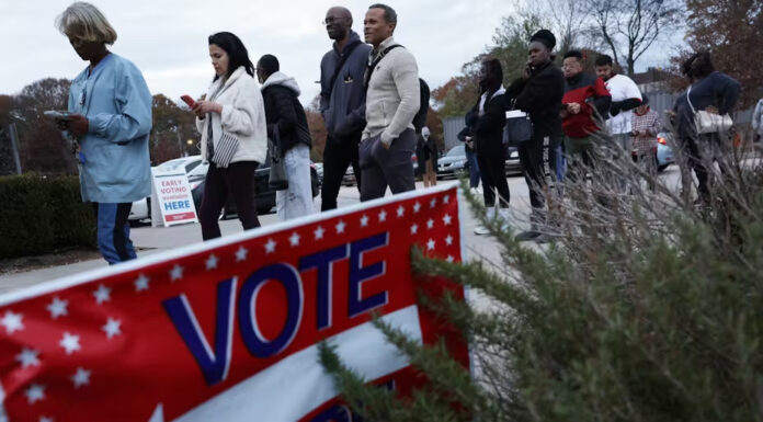 Voters of color wait in line to cast their ballots in Atlanta in 2022. Alex Wong/Getty Images