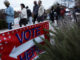 Voters of color wait in line to cast their ballots in Atlanta in 2022. Alex Wong/Getty Images