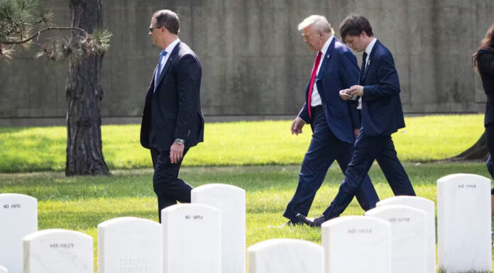 This photo, taken with permission from cemetery officials, shows Donald Trump during his visit to Arlington National Cemetery on Aug. 26, 2024. Kevin Carter/Getty Images