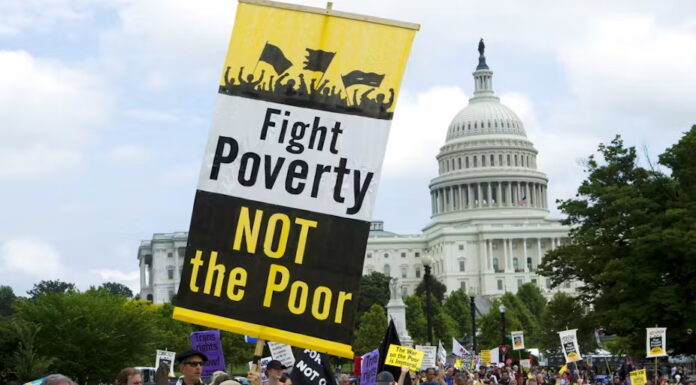 Demonstrators march outside the U.S. Capitol during the Poor People’s Campaign rally at the National Mall in Washington on June 23, 2018. AP Photo/Jose Luis Magana