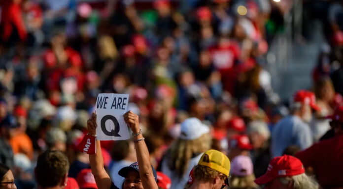 QAnon supporters wait for Donald Trump to speak at a campaign rally at Atlantic Aviation on September 22, 2020, in Moon Township, Pennsylvania. eff Swensen/Getty Images