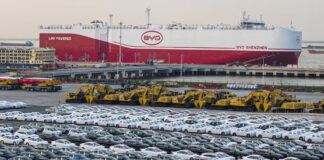BYD electric cars wait at a Chinese port to be loaded onto the automobile carrier BYD Shenzhen, which was slated to sail to Brazil. STR/AFP via Getty Images