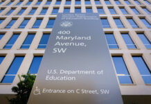 A sign marks the outside of the Department of Education headquarters in Washington, D.C. J. David Ake/Getty Images