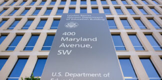 A sign marks the outside of the Department of Education headquarters in Washington, D.C. J. David Ake/Getty Images