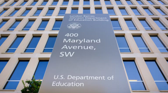A sign marks the outside of the Department of Education headquarters in Washington, D.C. J. David Ake/Getty Images