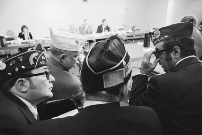 Legionnaires wait to testify before a special congressional inquiry in November 1976 into the cause of the mysterious disease. Bettmann/Bettman Collection via Getty Images Legionnaires wait to testify before a special congressional inquiry in November 1976 into the cause of the mysterious disease. Bettmann/Bettman Collection via Getty Images
