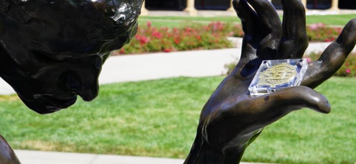 SEEGRAIN in the outstretched hand of Rodin's hero citizen of Calais is a monumental symbol of the mission to establish trust, good faith, and collaboration among all SEEGRAIN in the outstretched hand of Rodin's hero citizen of Calais is a monumental symbol of the mission to establish trust, good faith, and collaboration among all